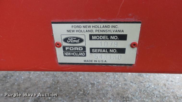 image for item DC3112 New Holland 1079 bale stacker