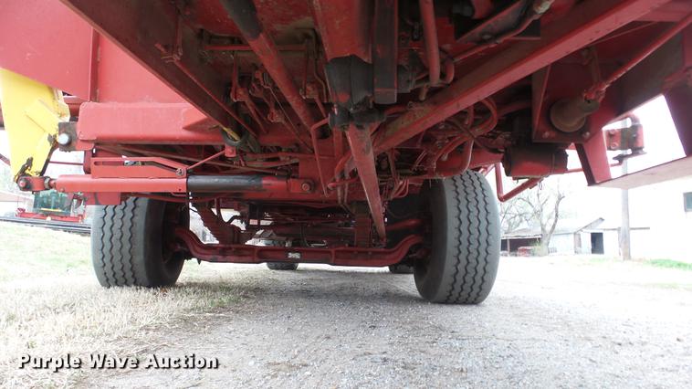 image for item DC3112 New Holland 1079 bale stacker