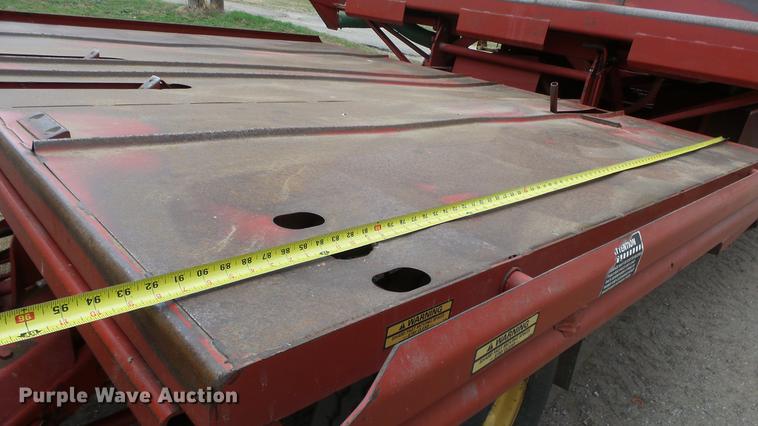 image for item DC3112 New Holland 1079 bale stacker