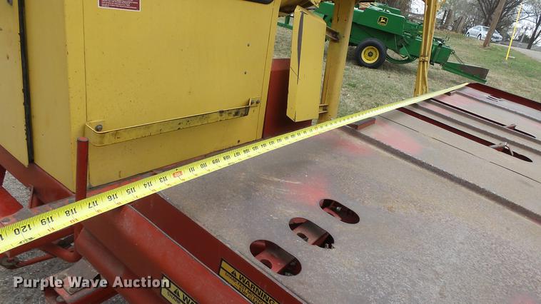 image for item DC3112 New Holland 1079 bale stacker