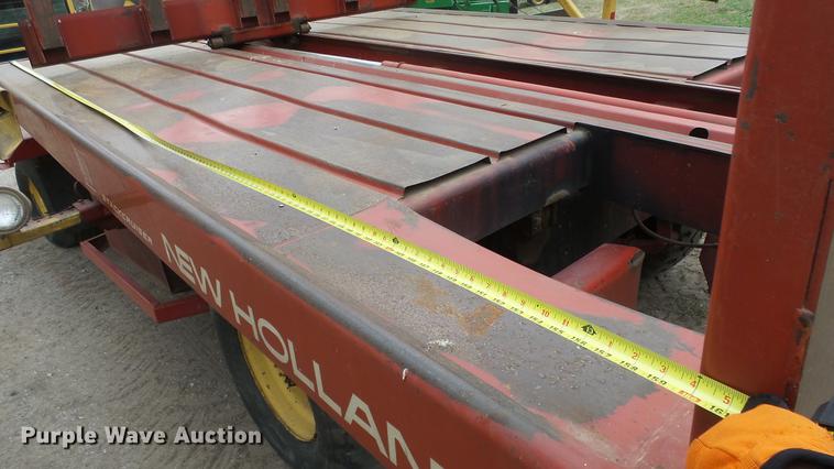 image for item DC3112 New Holland 1079 bale stacker