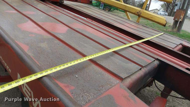 image for item DC3112 New Holland 1079 bale stacker