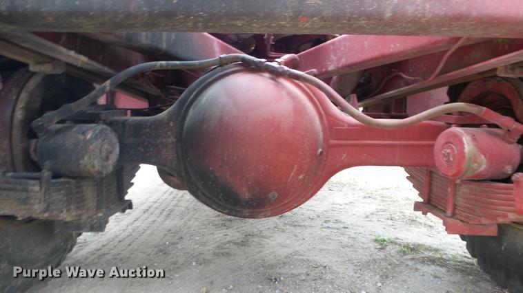 image for item DC3112 New Holland 1079 bale stacker