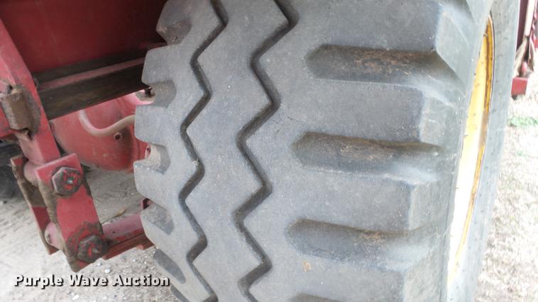 image for item DC3112 New Holland 1079 bale stacker