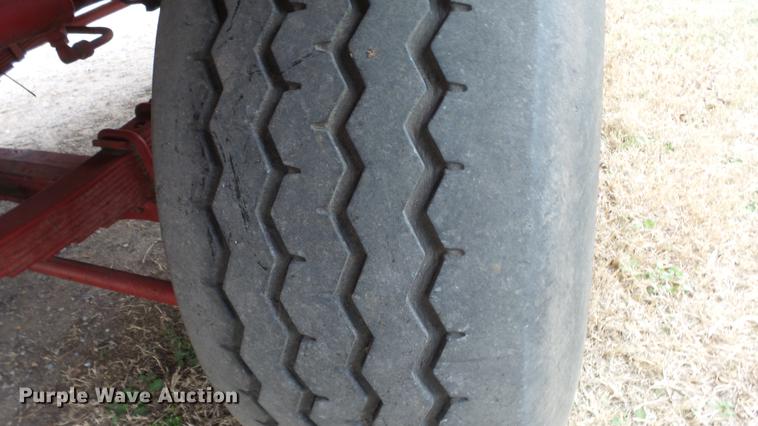 image for item DC3112 New Holland 1079 bale stacker