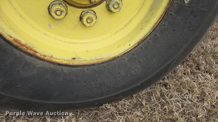 image for item DC3112 New Holland 1079 bale stacker