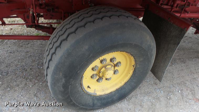 image for item DC3112 New Holland 1079 bale stacker