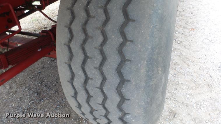 image for item DC3112 New Holland 1079 bale stacker