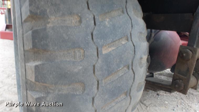 image for item DC3112 New Holland 1079 bale stacker