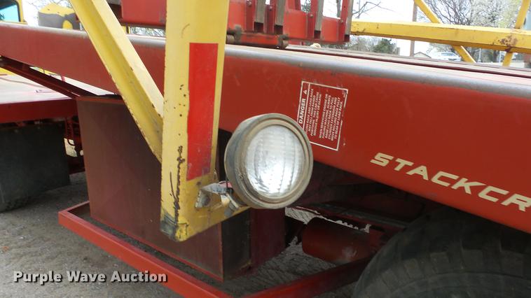 image for item DC3112 New Holland 1079 bale stacker