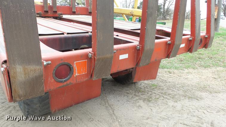 image for item DC3112 New Holland 1079 bale stacker