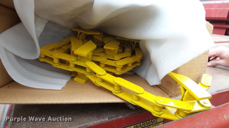 image for item DC3112 New Holland 1079 bale stacker