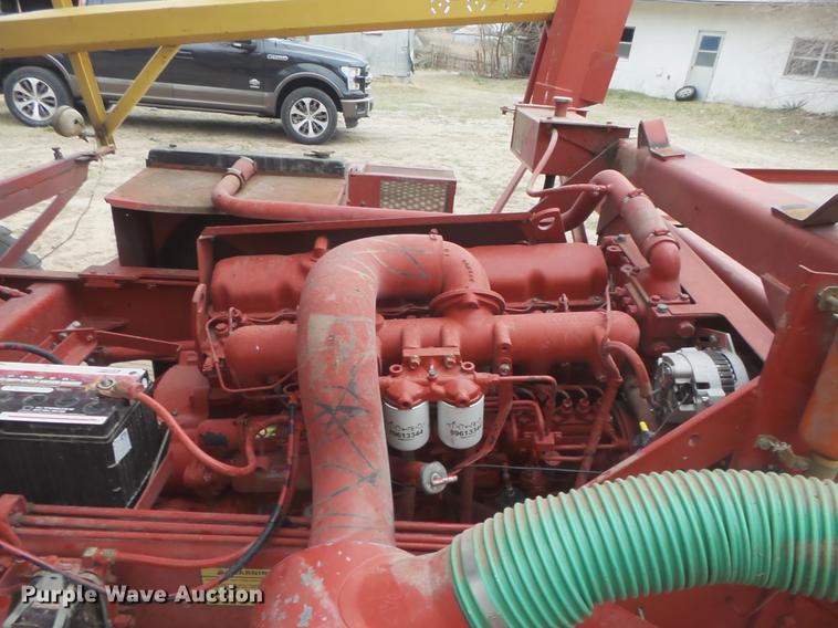 image for item DC3112 New Holland 1079 bale stacker