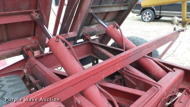 image for item DC3112 New Holland 1079 bale stacker