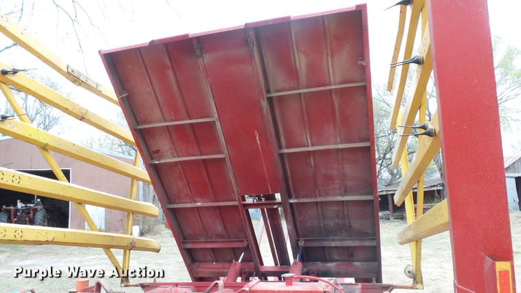 image for item DC3112 New Holland 1079 bale stacker