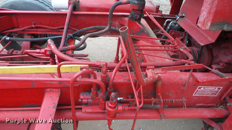 image for item DC3112 New Holland 1079 bale stacker