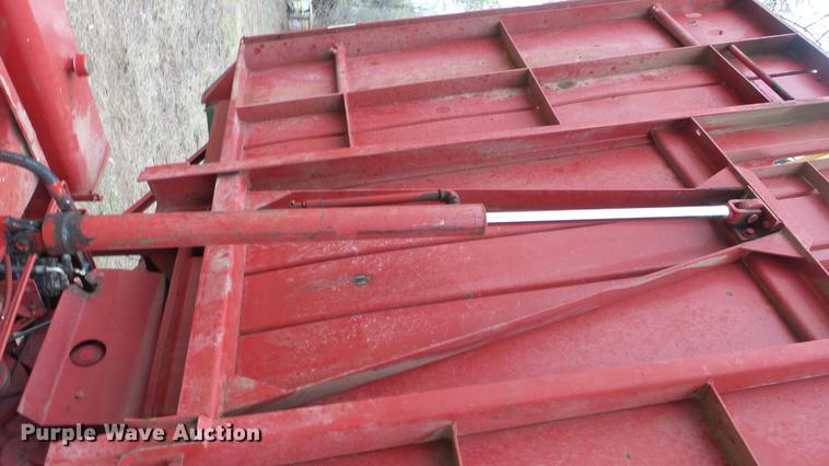 image for item DC3112 New Holland 1079 bale stacker