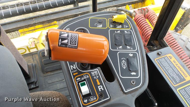 image for item DC3119 2003 New Holland HW320 windrower