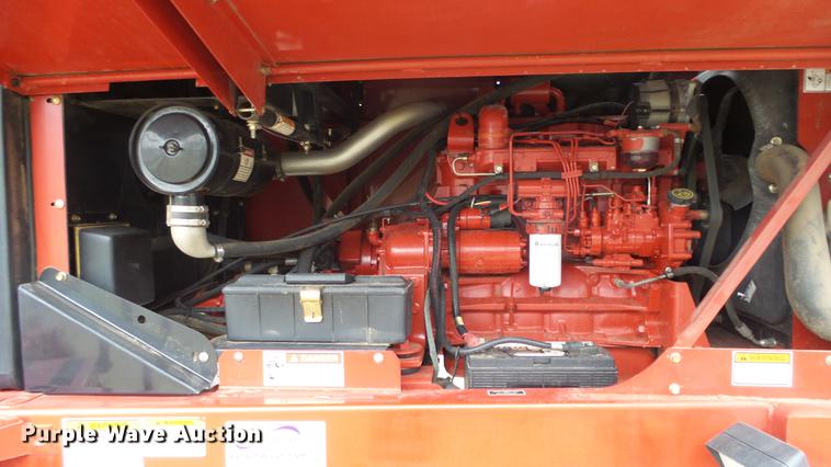 image for item DC3119 2003 New Holland HW320 windrower