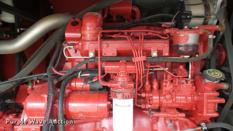 image for item DC3119 2003 New Holland HW320 windrower