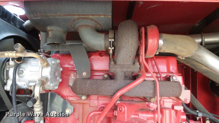 image for item DC3119 2003 New Holland HW320 windrower