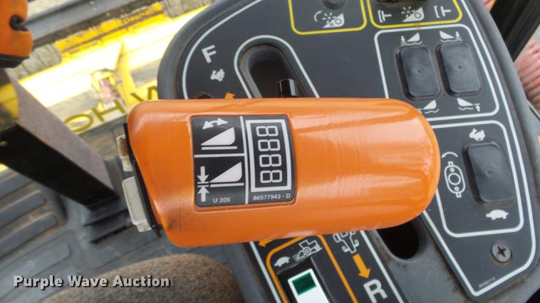 image for item DC3119 2003 New Holland HW320 windrower