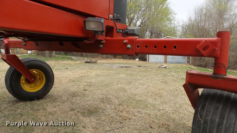 image for item DC3119 2003 New Holland HW320 windrower