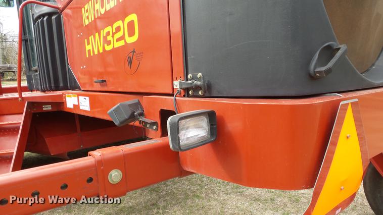 image for item DC3119 2003 New Holland HW320 windrower