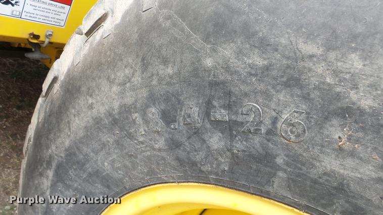 image for item DC3119 2003 New Holland HW320 windrower