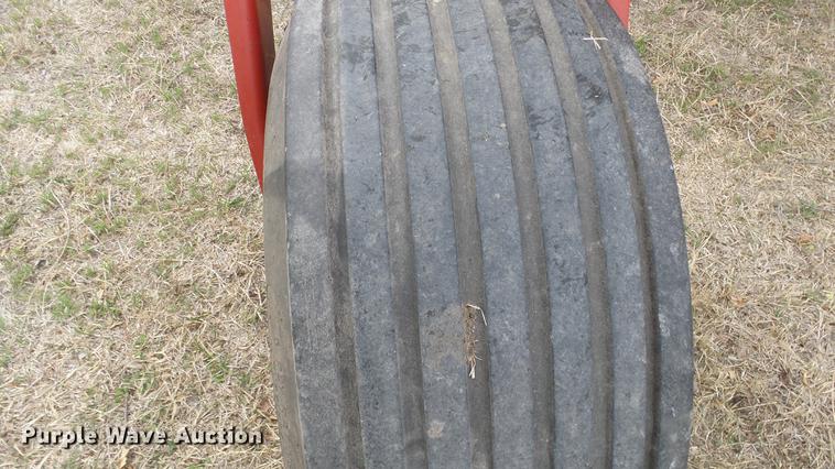 image for item DC3119 2003 New Holland HW320 windrower