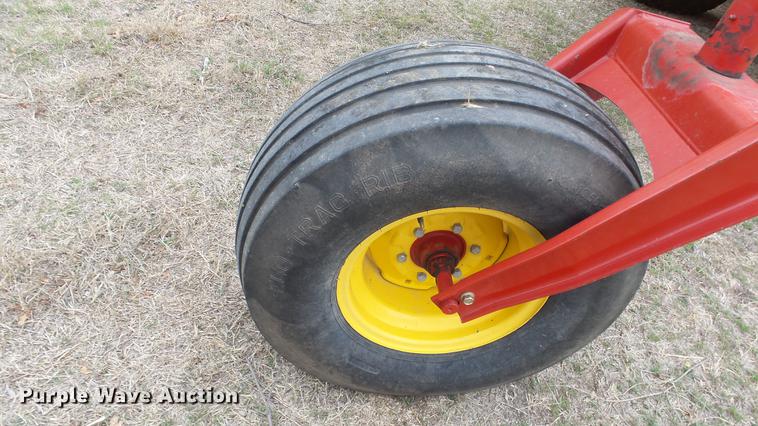 image for item DC3119 2003 New Holland HW320 windrower