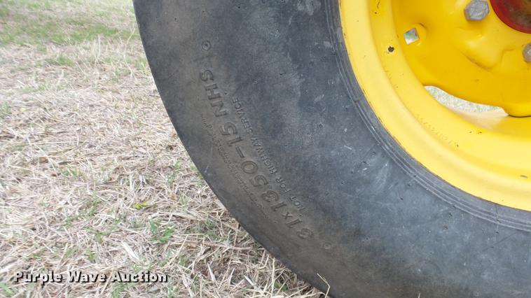 image for item DC3119 2003 New Holland HW320 windrower