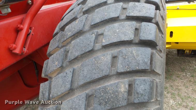 image for item DC3119 2003 New Holland HW320 windrower