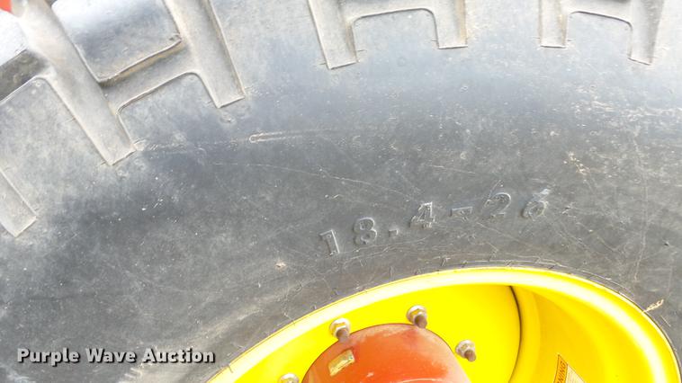 image for item DC3119 2003 New Holland HW320 windrower