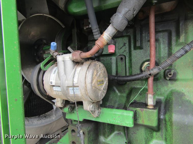 image for item DE6715 1992 John Deere 8560 4WD tractor