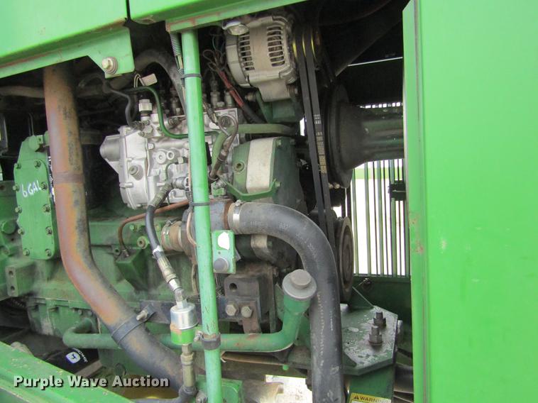 image for item DE6715 1992 John Deere 8560 4WD tractor