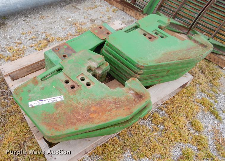image for item EJ9980 Approximately 12 John Deere counter weights