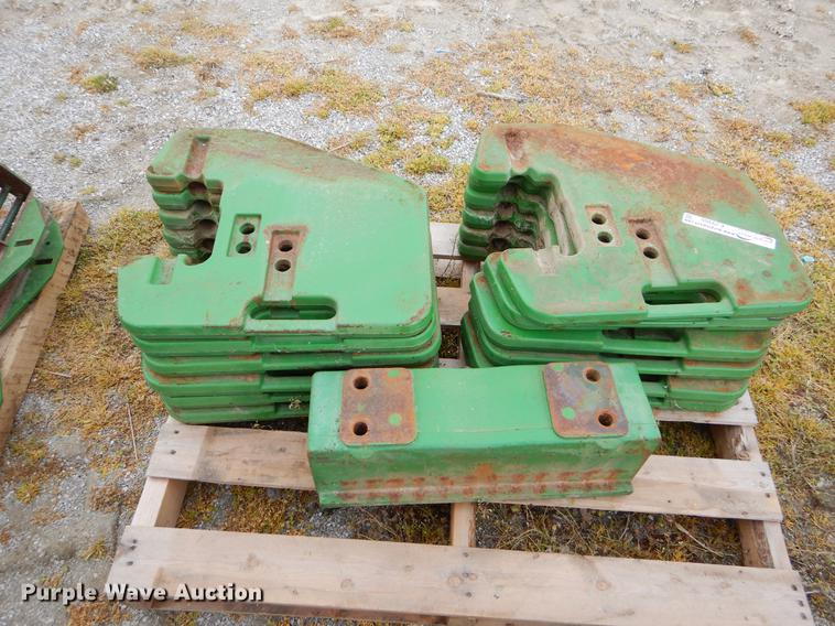 image for item EJ9980 Approximately 12 John Deere counter weights