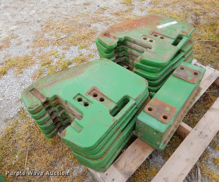 image for item EJ9980 Approximately 12 John Deere counter weights
