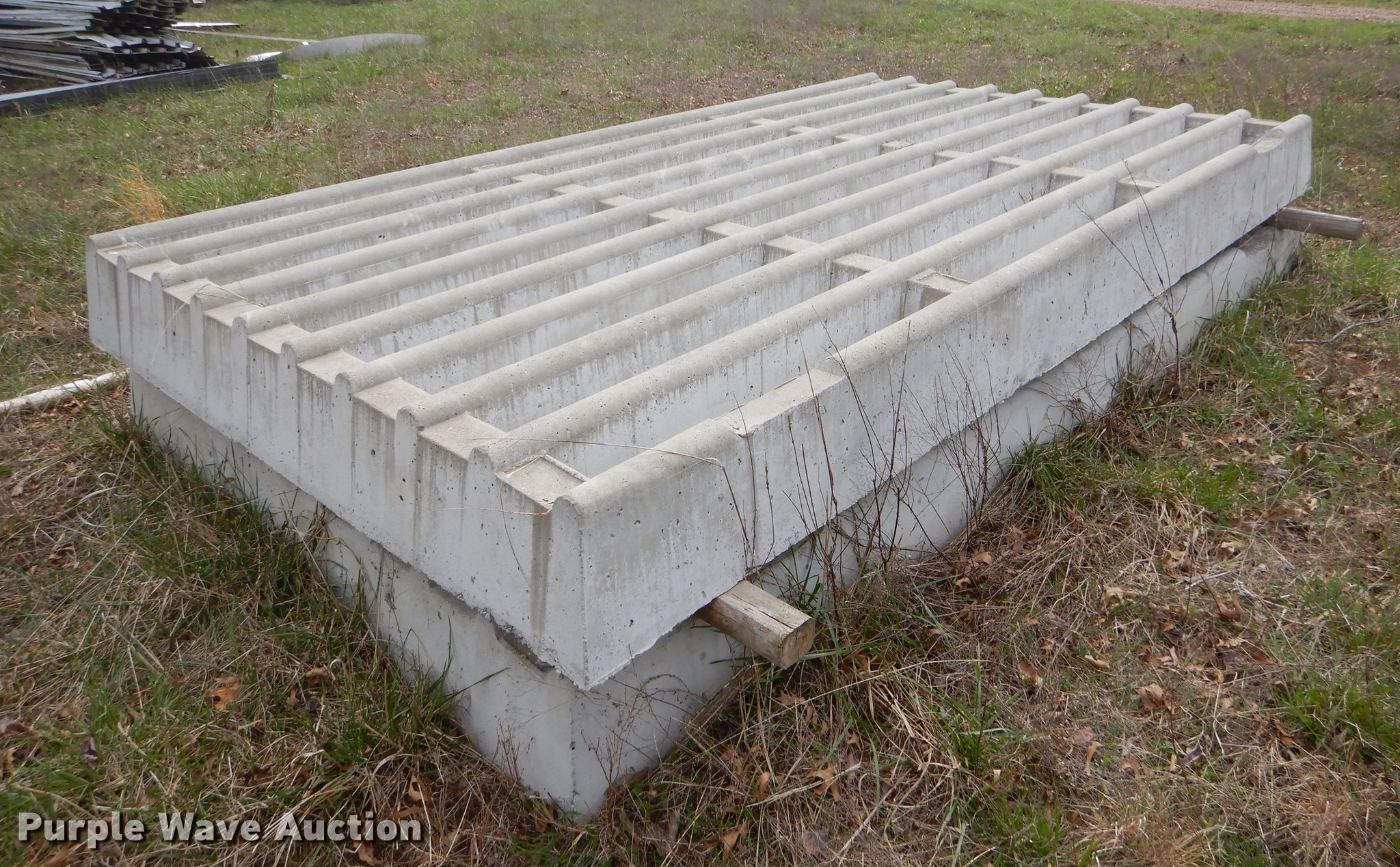 (2) concrete cattle guards in Parsons, KS Item EJ9938 sold Purple Wave