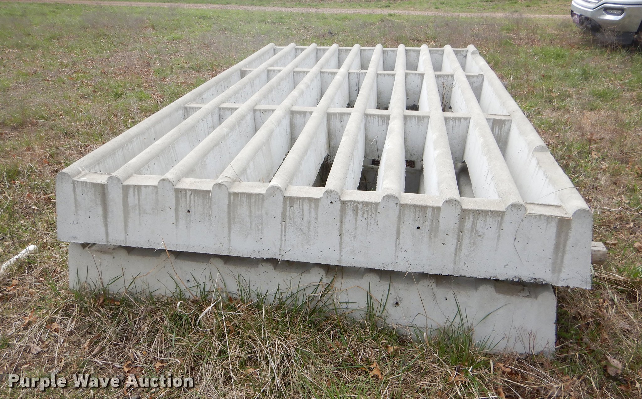 (2) concrete cattle guards in Parsons, KS Item EJ9938 sold Purple Wave
