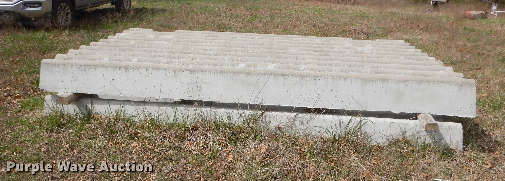 (2) concrete cattle guards in Parsons, KS Item EJ9938 sold Purple Wave