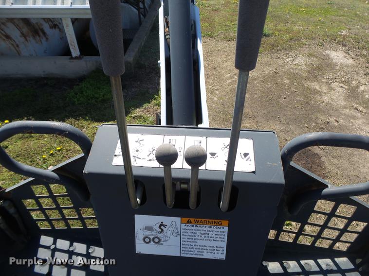 image for item DE3621 Bobcat 607 skid steer backhoe attachment