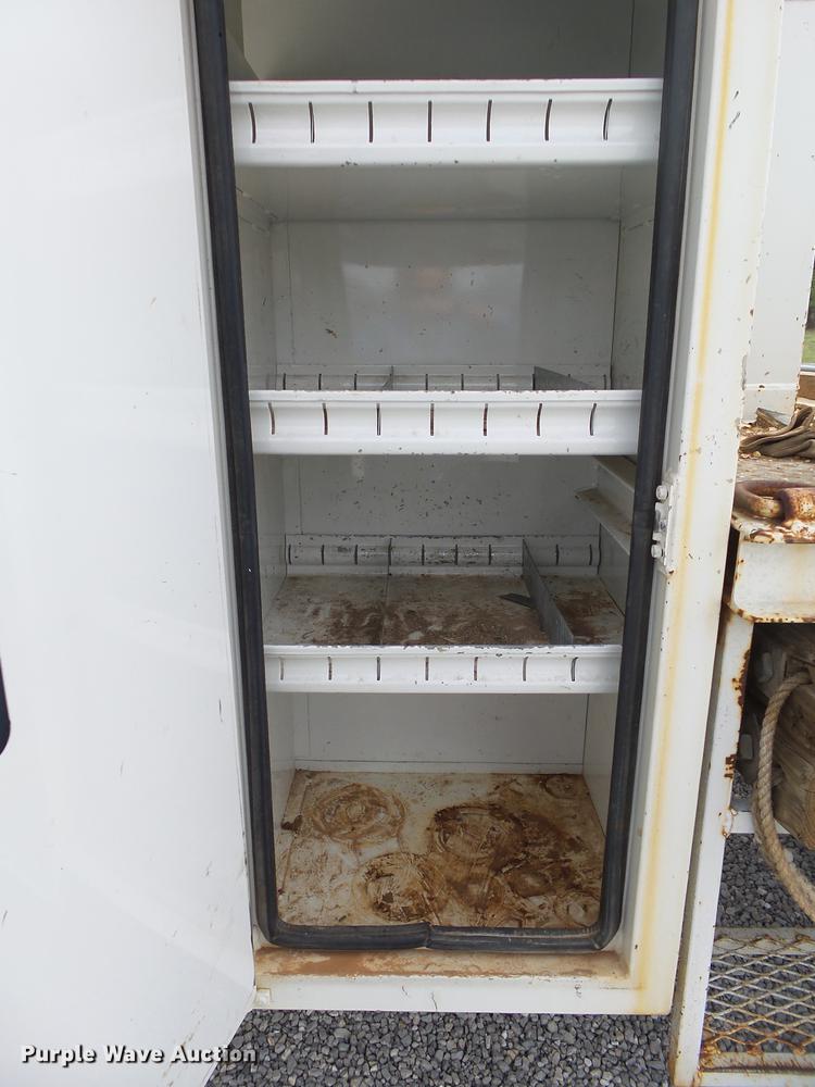 image for item DE3626 1997 Ford F700 digger derrick truck