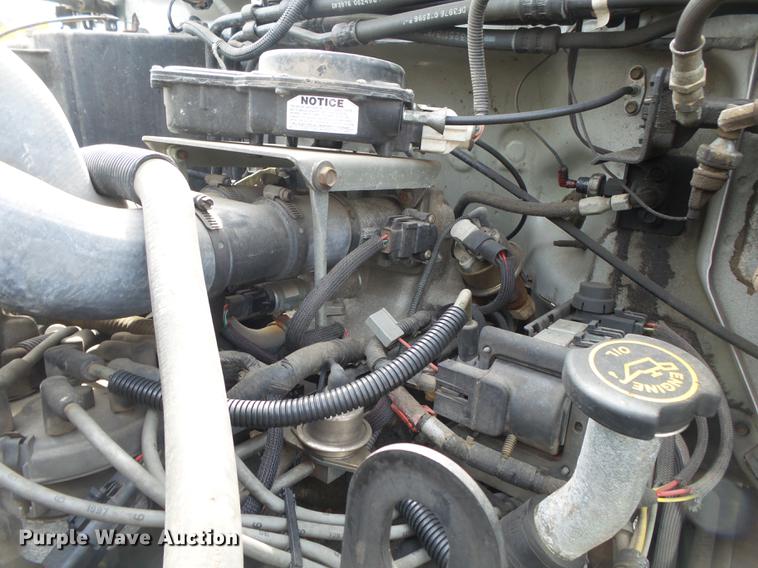 image for item DE3626 1997 Ford F700 digger derrick truck