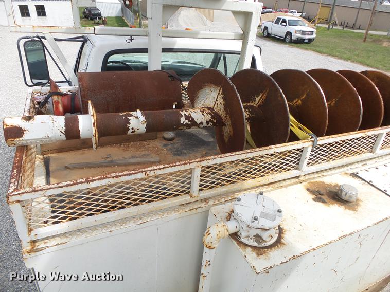 image for item DE3626 1997 Ford F700 digger derrick truck