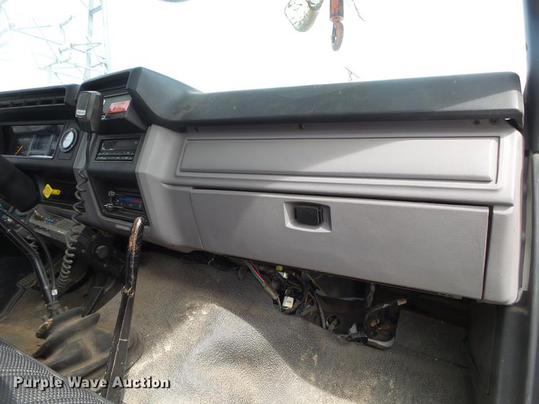 image for item DE3626 1997 Ford F700 digger derrick truck