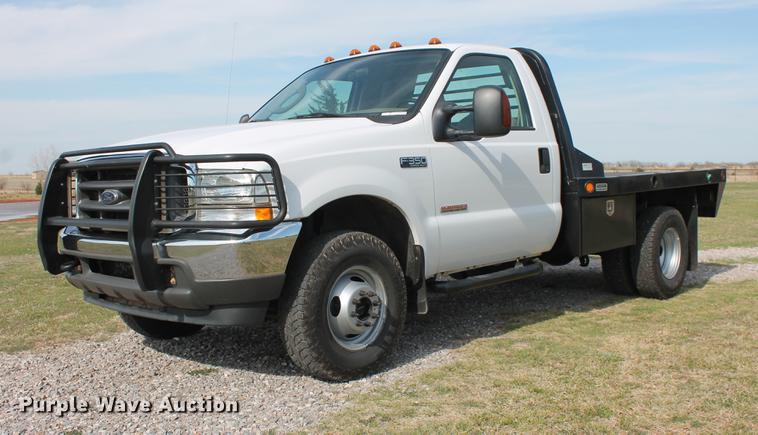 image for item AP9336 2004 Ford F350 Super Duty XLT flatbed pickup truck