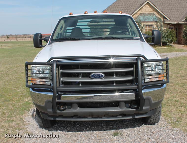 image for item AP9336 2004 Ford F350 Super Duty XLT flatbed pickup truck