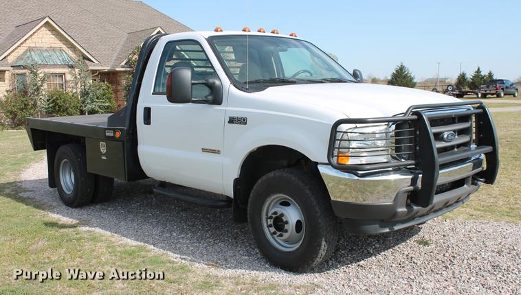 image for item AP9336 2004 Ford F350 Super Duty XLT flatbed pickup truck